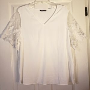 Beautiful white blouse with lace arms